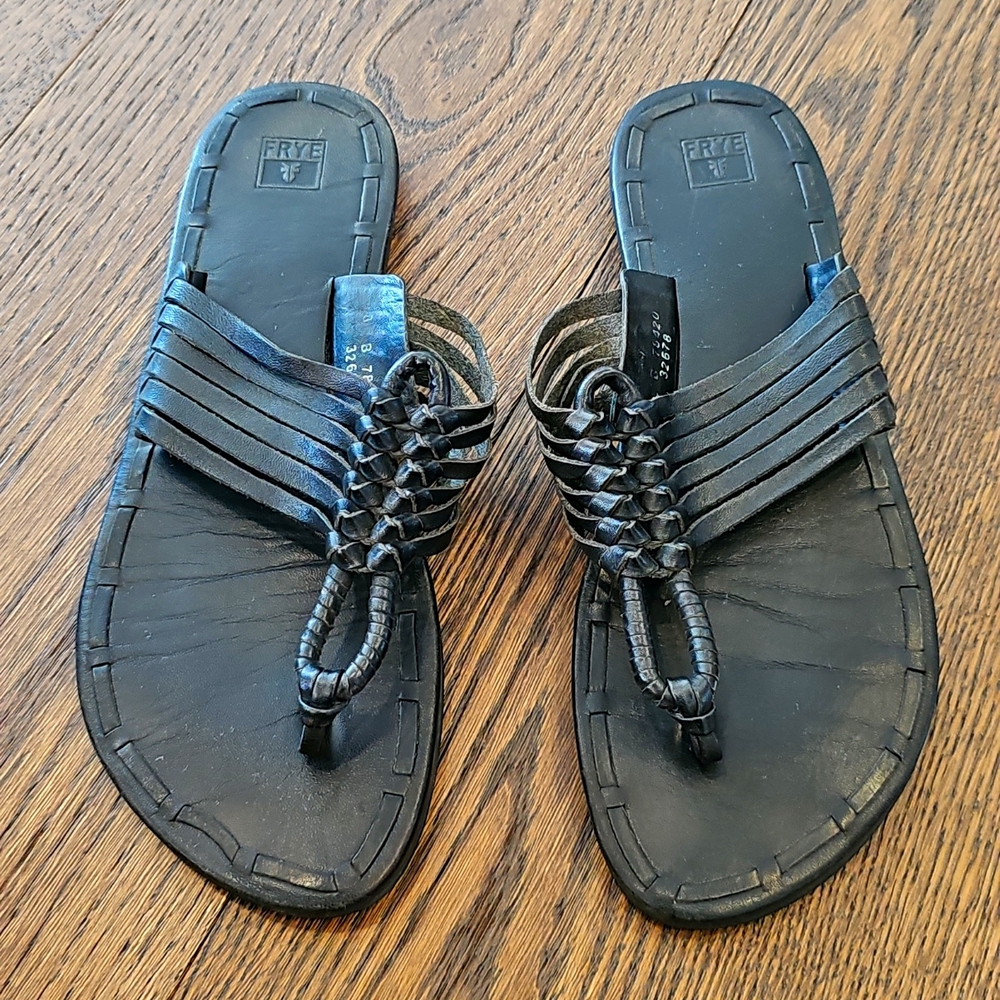 Frye ladies black leather woven flip flop sandals.